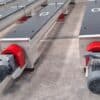 Motor end detail of ADDAMS screw conveyors with red drive guards