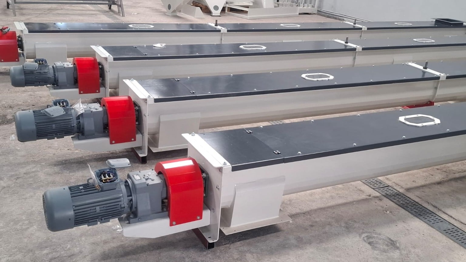 ADDAMS screw conveyor assemblies with removable covers and inspection openings