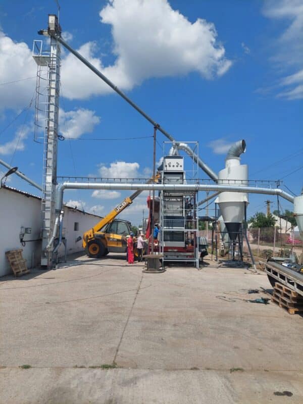Outdoor ADDAMS processing installation with a bucket elevator, cleaning equipment and cyclone ducting