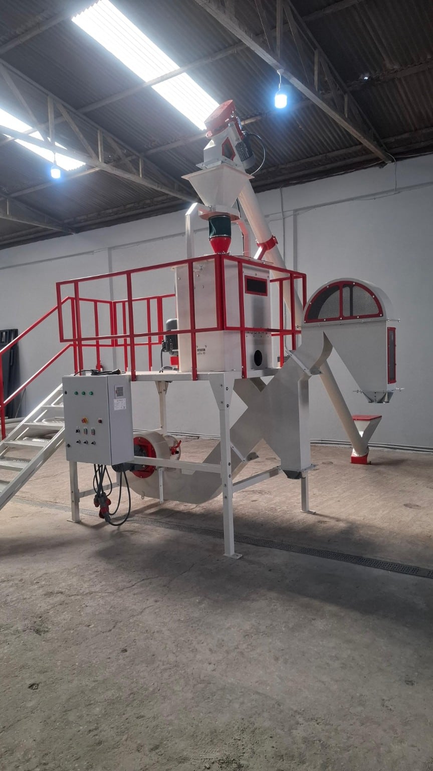 ADDAMS processing equipment with feed hopper, access platform, ducting and control panel