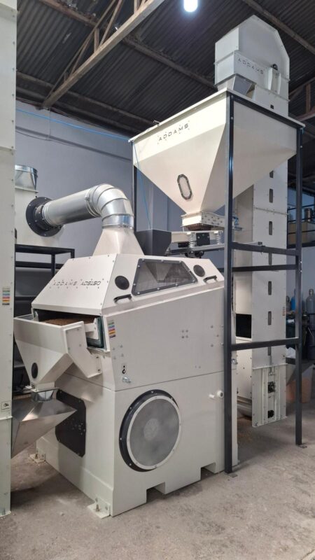 ADDAMS processing separator with feed hopper, aspiration duct and bucket elevator in the workshop